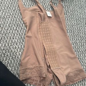 Bring New Girdle never used ripped the tag off by accident no pets